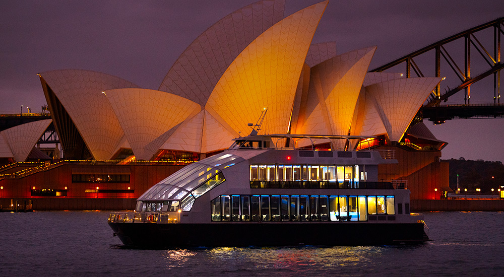 Clearview Christmas Party Cruise gliding past the Opera House and Harbour Bridge