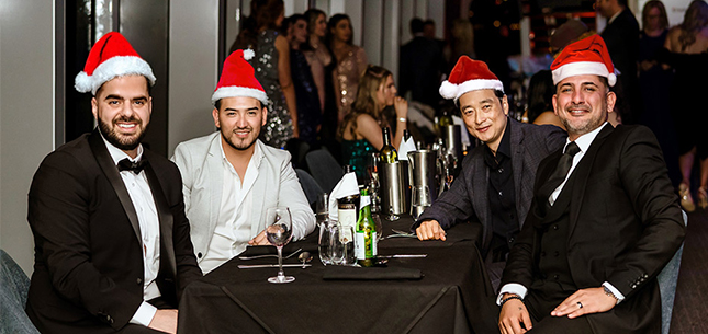 Corporate group celebrating on Clearview Xmas party dinner cruise