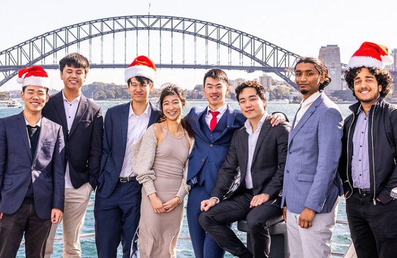 Colleagues celebrating a work Christmas party on board
