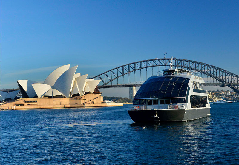 Clearview Christmas Day Cruise cruising with the Sydney Opera House in the background