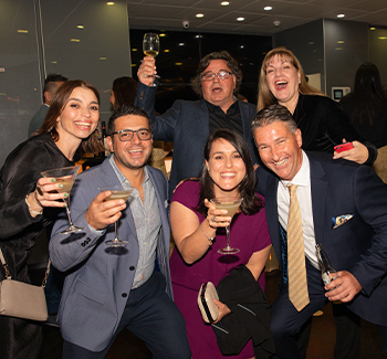 Guests enjoying drinks aboard the Clearview dinner cruise