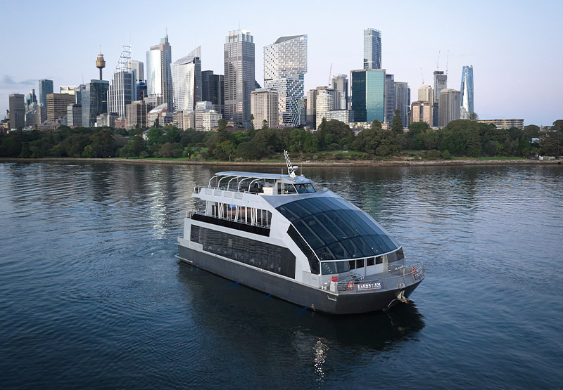 A luxury lunch cruise with floor-to-ceiling glass windows on the waters of Sydney Harbour