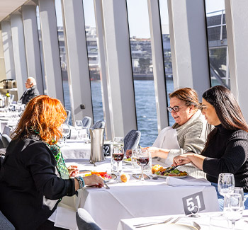 Guest enjoying food on Clearview lunch cruise
