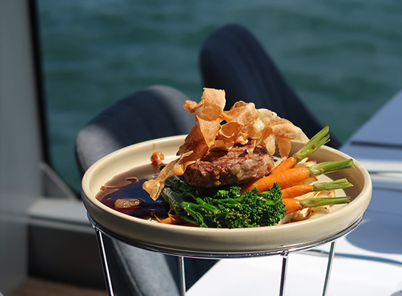Tasty dishes prepared using fresh produce served on Clearview glass boat cruise