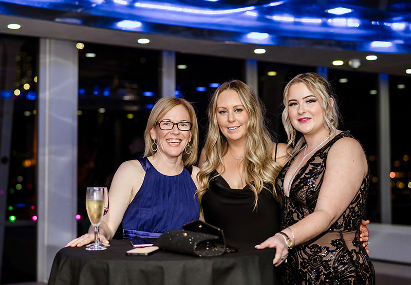 Guests enjoying the Clearview Wine-Paired Dinner Cruise experience