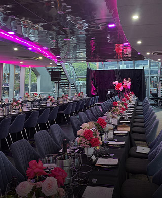 The luxury interior dining area of Clearview premium glass boat cruise